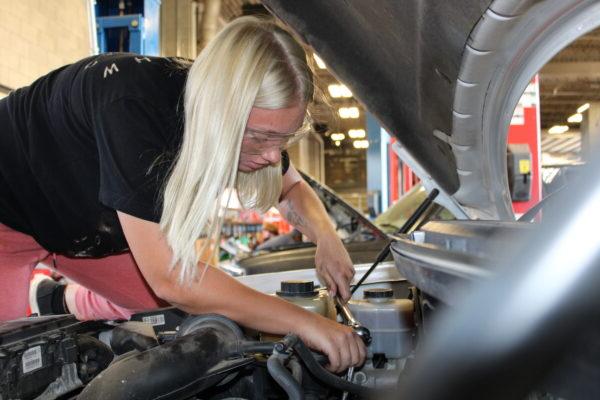 A person working on a car